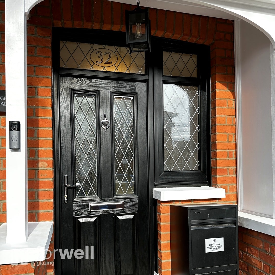 Black composite front door with leaded side light Black composite front door with leaded side light
