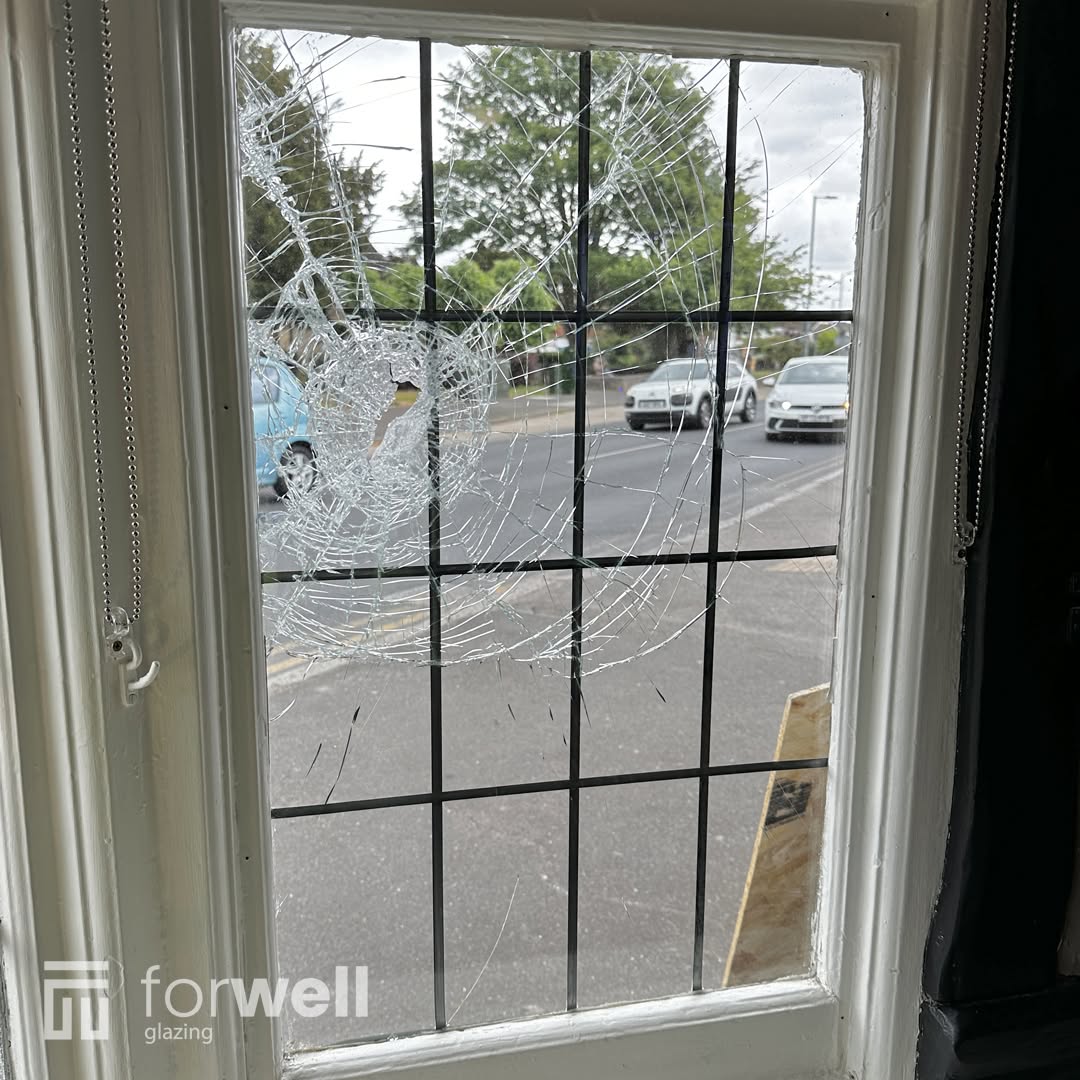 Smashed double glazed window pane awaiting repair Smashed double glazed window pane awaiting repair